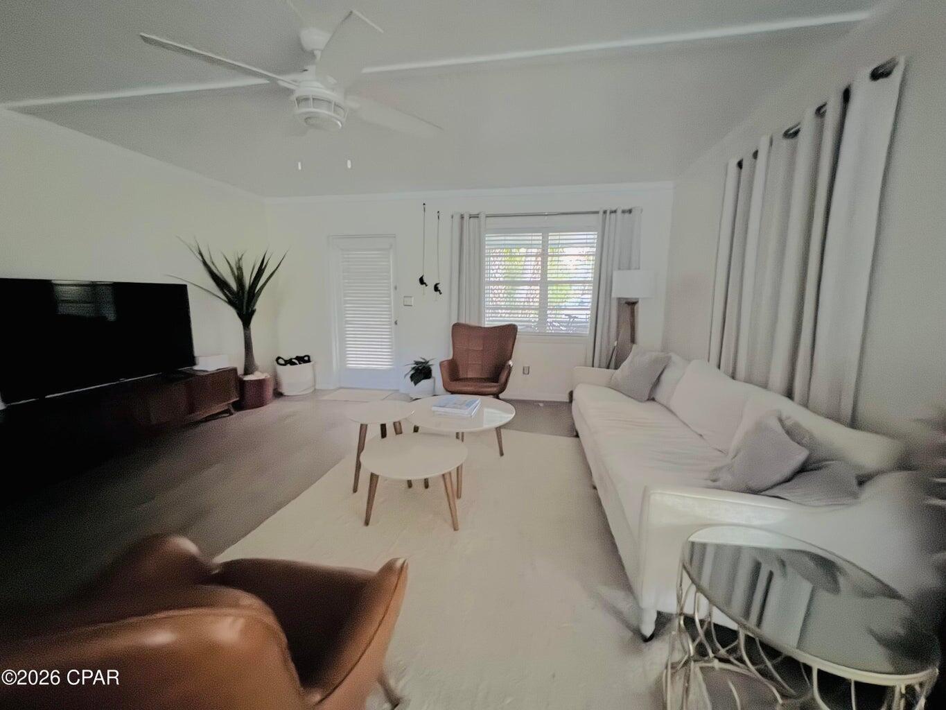 181 Gulf Point Road Santa Rosa Beach, FL 32459 - Photo 3 of 18 a living room with furniture and a window