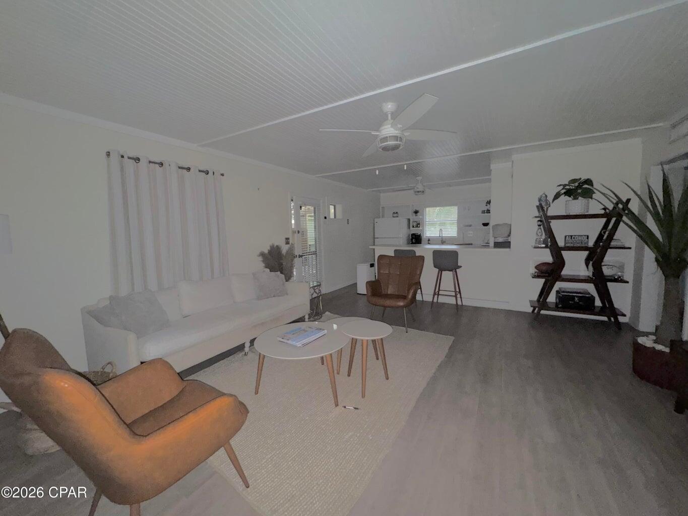 181 Gulf Point Road Santa Rosa Beach, FL 32459 - Photo 6 of 18 a living room with furniture and a large window