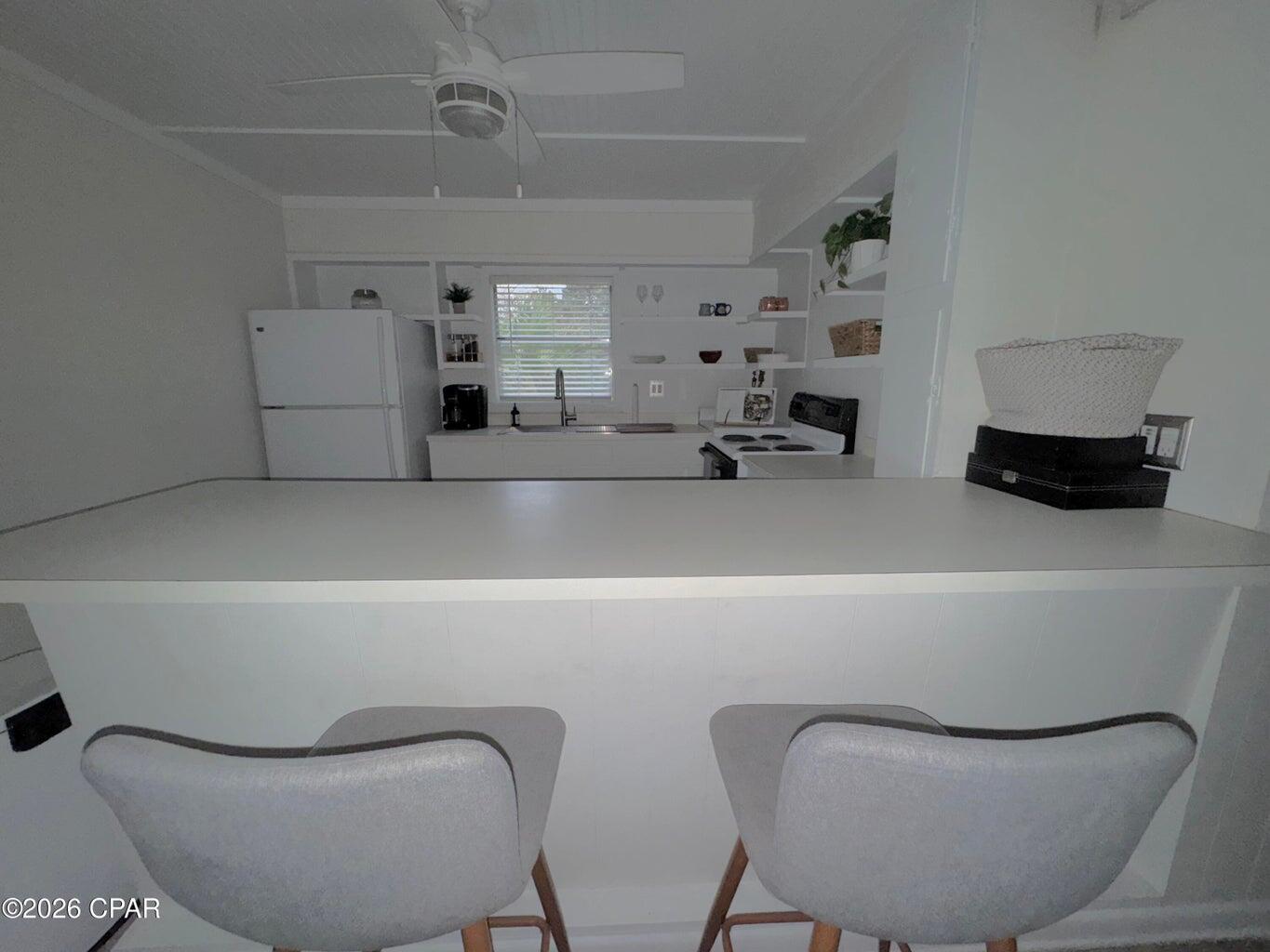 181 Gulf Point Road Santa Rosa Beach, FL 32459 - Photo 8 of 18 a living room with furniture and a couch