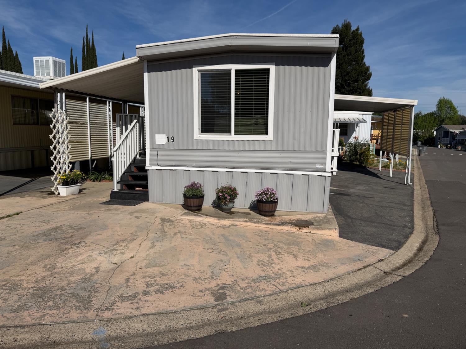 9060 Auburn Folsom Road, Unit 19 Granite Bay, CA 95746 - Photo 19 of 30 a view of a house with backyard and porch