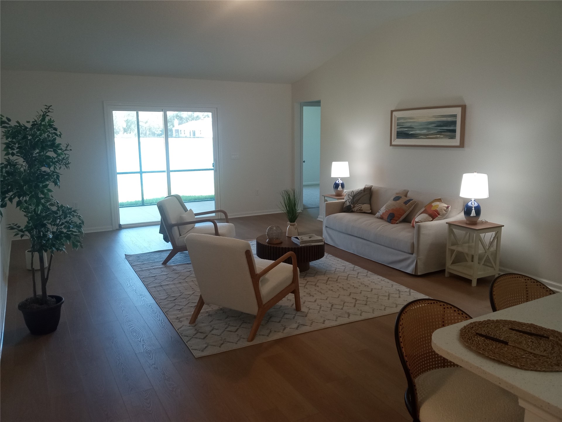 96052 Pirates Bluff Road Yulee, FL 32097 - Photo 8 of 22 a living room with furniture and a potted plant