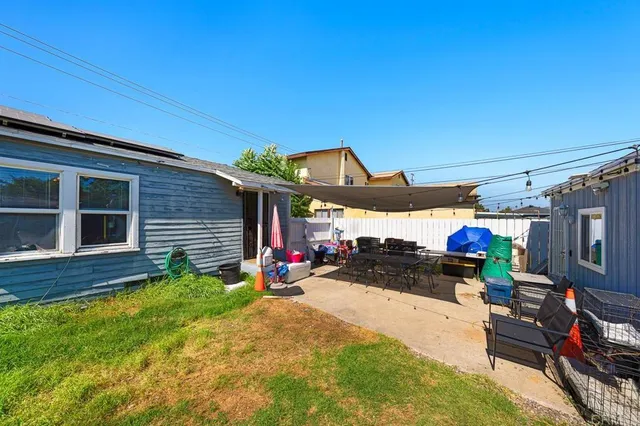 a view of a chairs and table in the patio