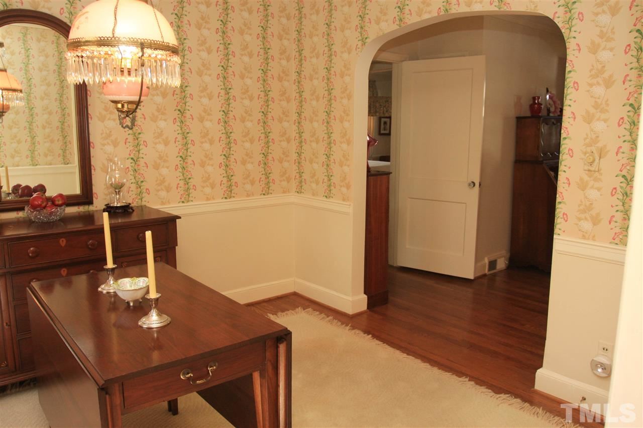 3117 Georgian Terrace Raleigh, NC 27607 - Photo 9 of 25 a dining room with furniture and window