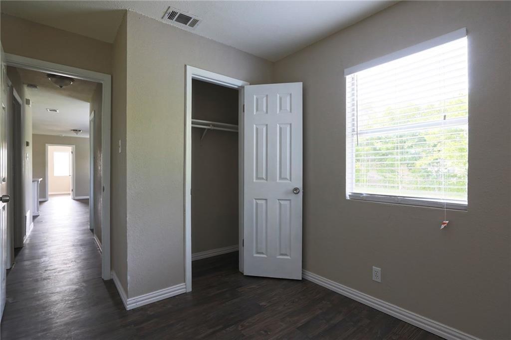 1410 Ransom Street Pflugerville, TX 78660 - Photo 11 of 22 a view of empty room with wooden floor and fan