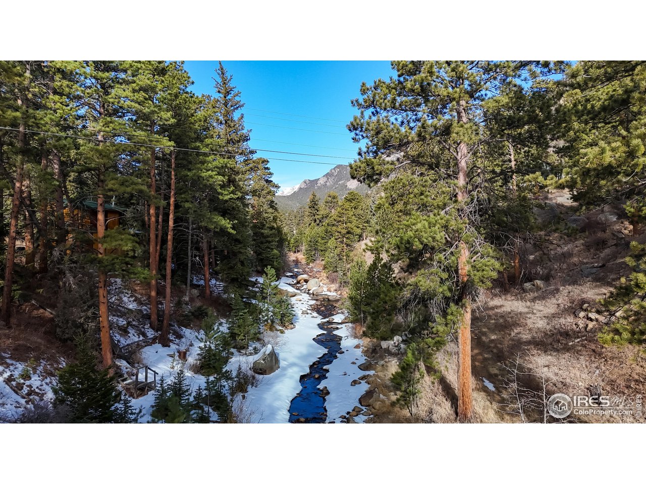 2760 Fall River Road, Unit 288 Estes Park, CO 80517 - Photo 9 of 32 River that goes right by the condo.