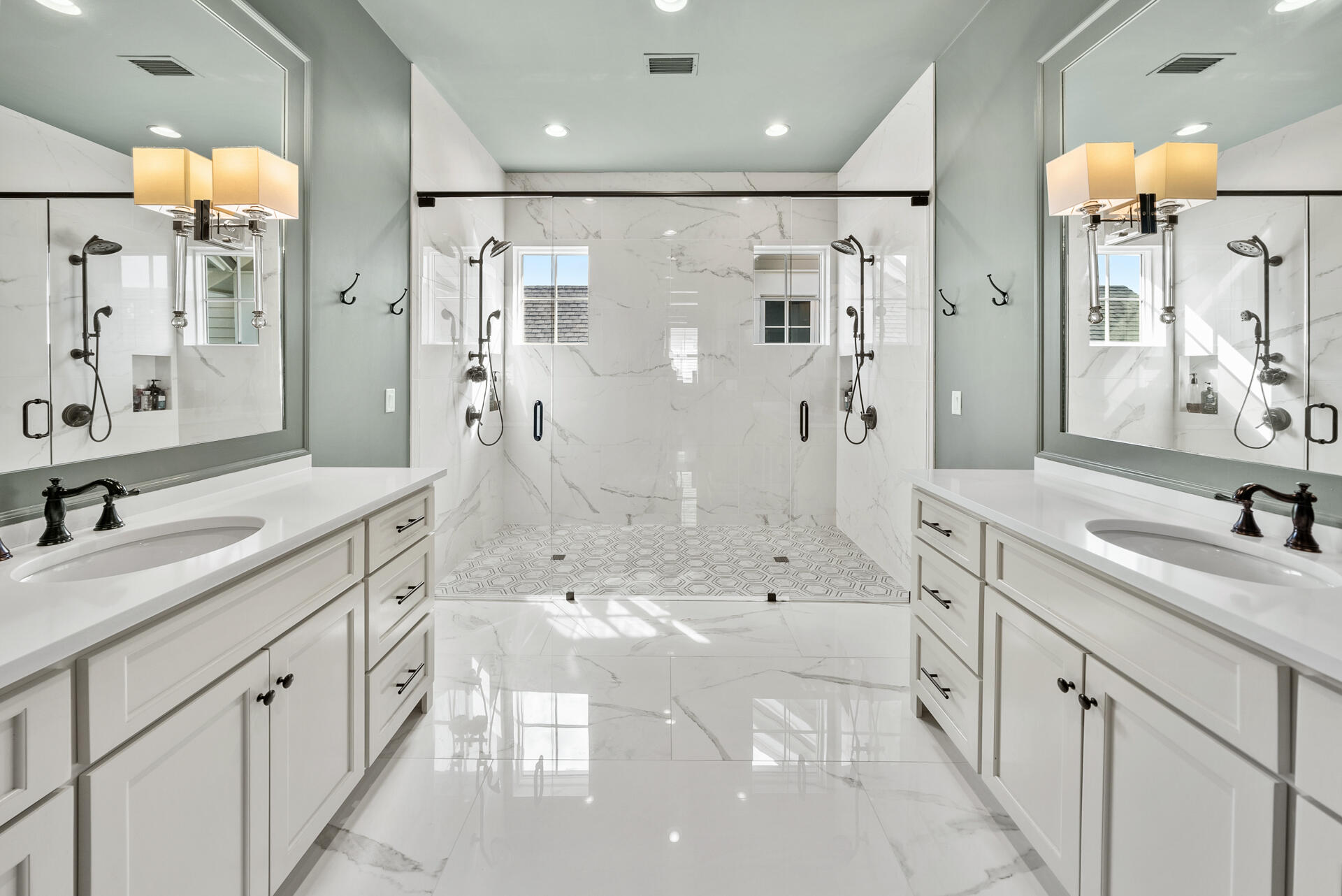 257 Moonlit Way Destin, FL 32541 - Photo 21 of 62 a spacious bathroom with a shower sink double vanity and a mirror