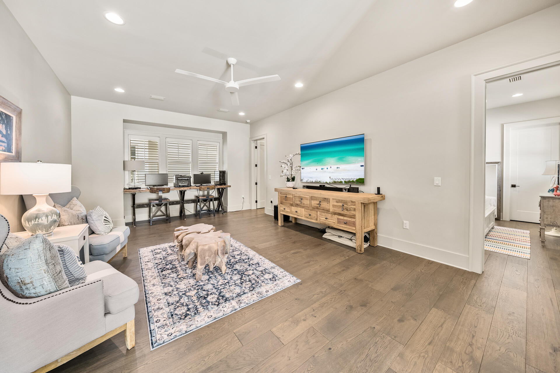 257 Moonlit Way Destin, FL 32541 - Photo 31 of 62 a living room with furniture and a wooden floor