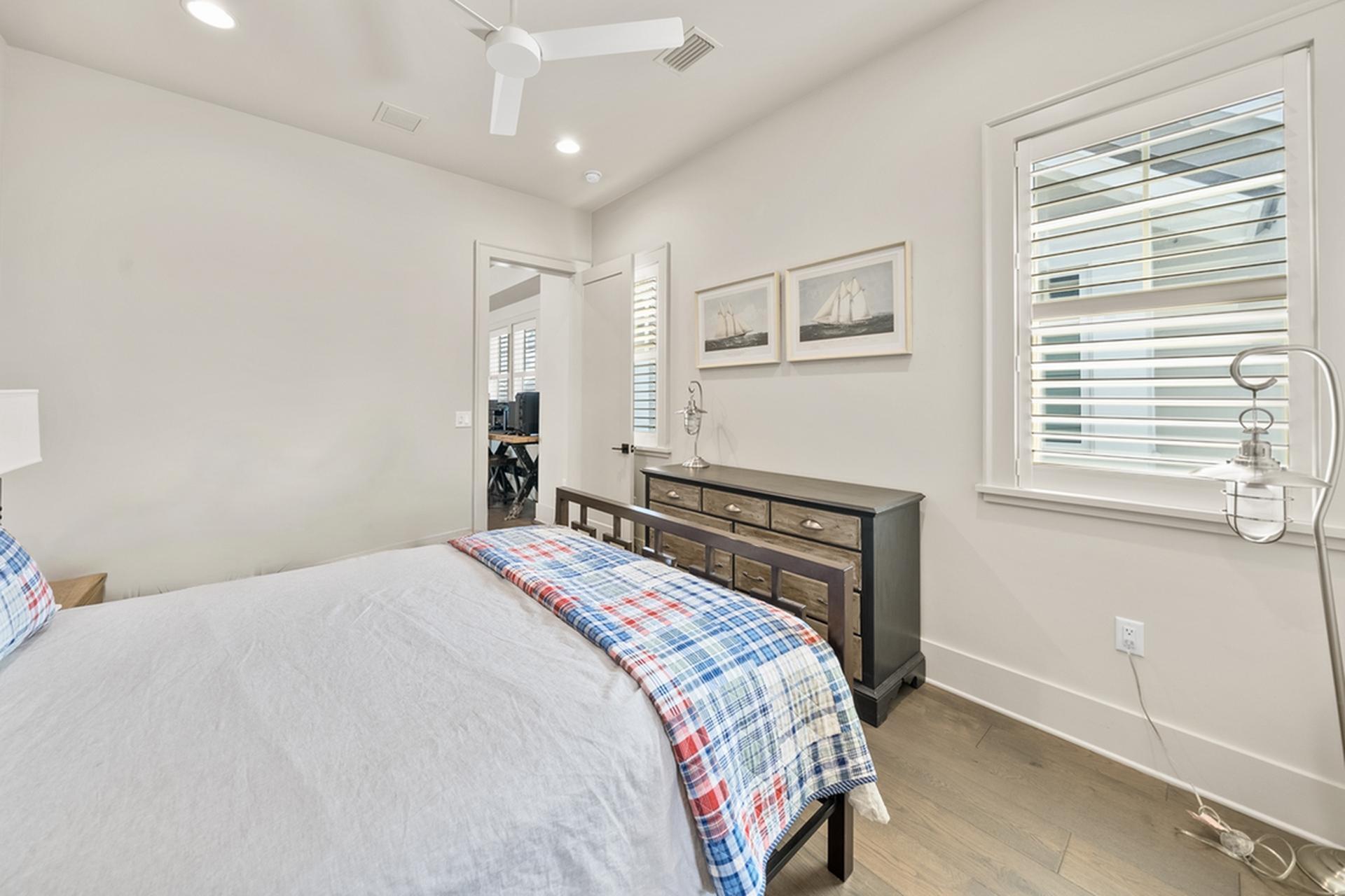 257 Moonlit Way Destin, FL 32541 - Photo 34 of 62 a bedroom with a bed and a window