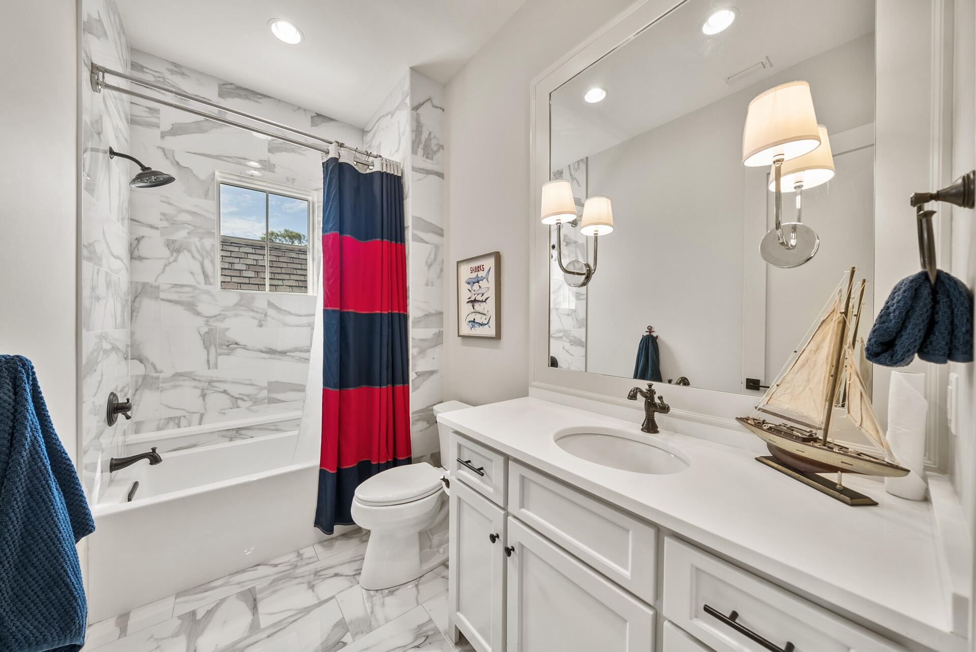 257 Moonlit Way Destin, FL 32541 - Photo 35 of 62 a bathroom with a sink a toilet and shower