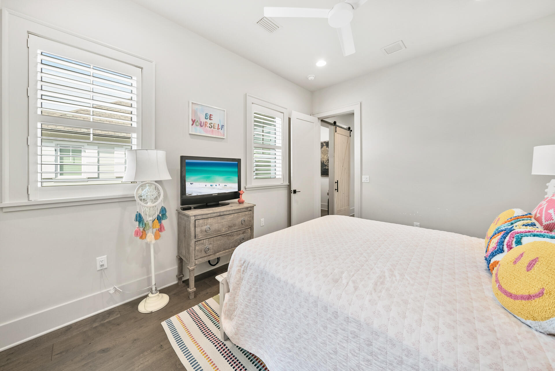 257 Moonlit Way Destin, FL 32541 - Photo 37 of 62 a bedroom with a bed and a flat screen tv