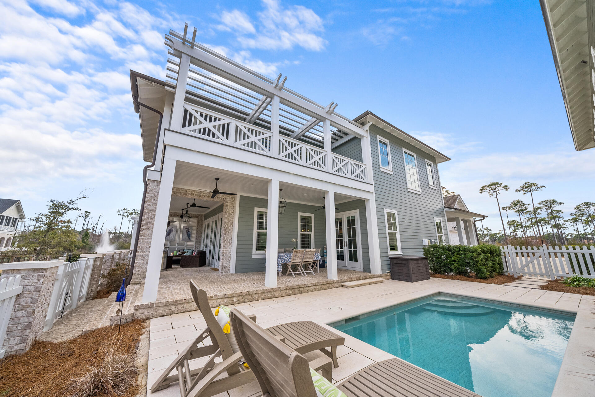 257 Moonlit Way Destin, FL 32541 - Photo 46 of 62 a view of a house with swimming pool and sitting area