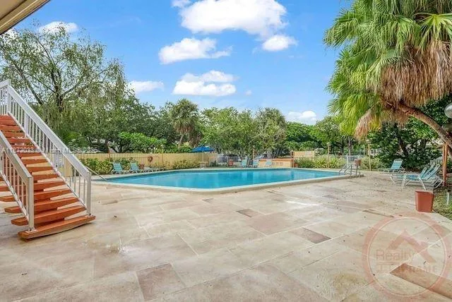 a view of outdoor space deck and tree