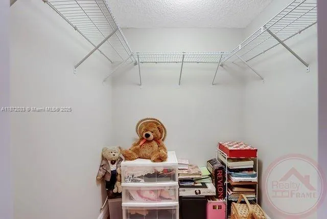 a room with storage and utility room