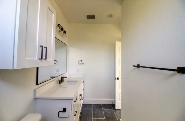 a view of a hallway with entryway