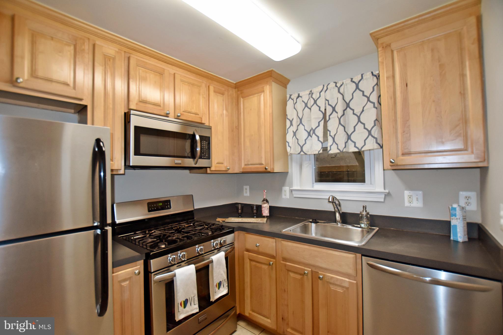 516 Thayer Avenue, Unit 2 Silver Spring, MD 20910 - Photo 11 of 12 Kitchen with Stainless Steel Appliances