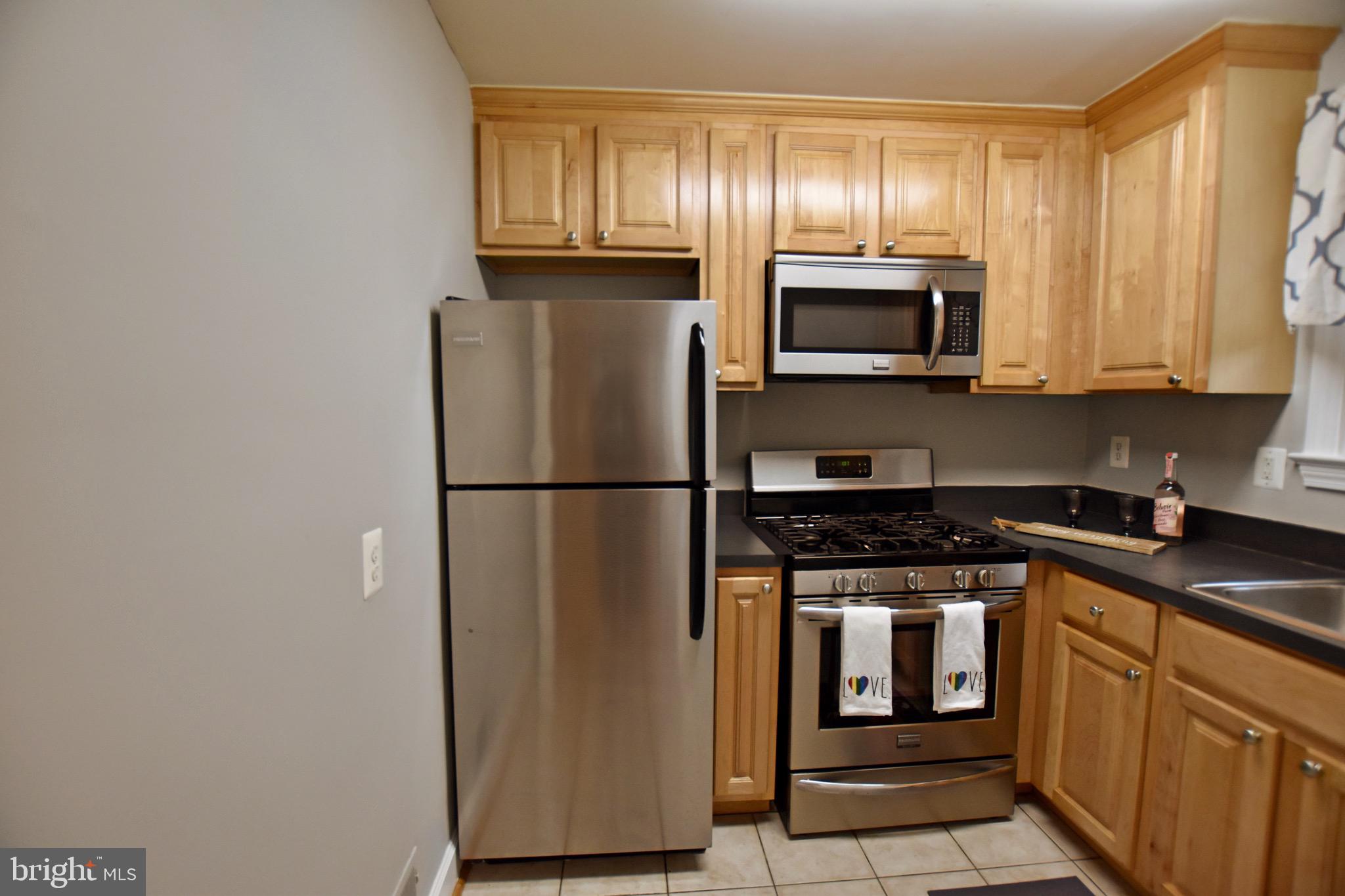 516 Thayer Avenue, Unit 2 Silver Spring, MD 20910 - Photo 12 of 12 Kitchen with Stainless Steel Appliances