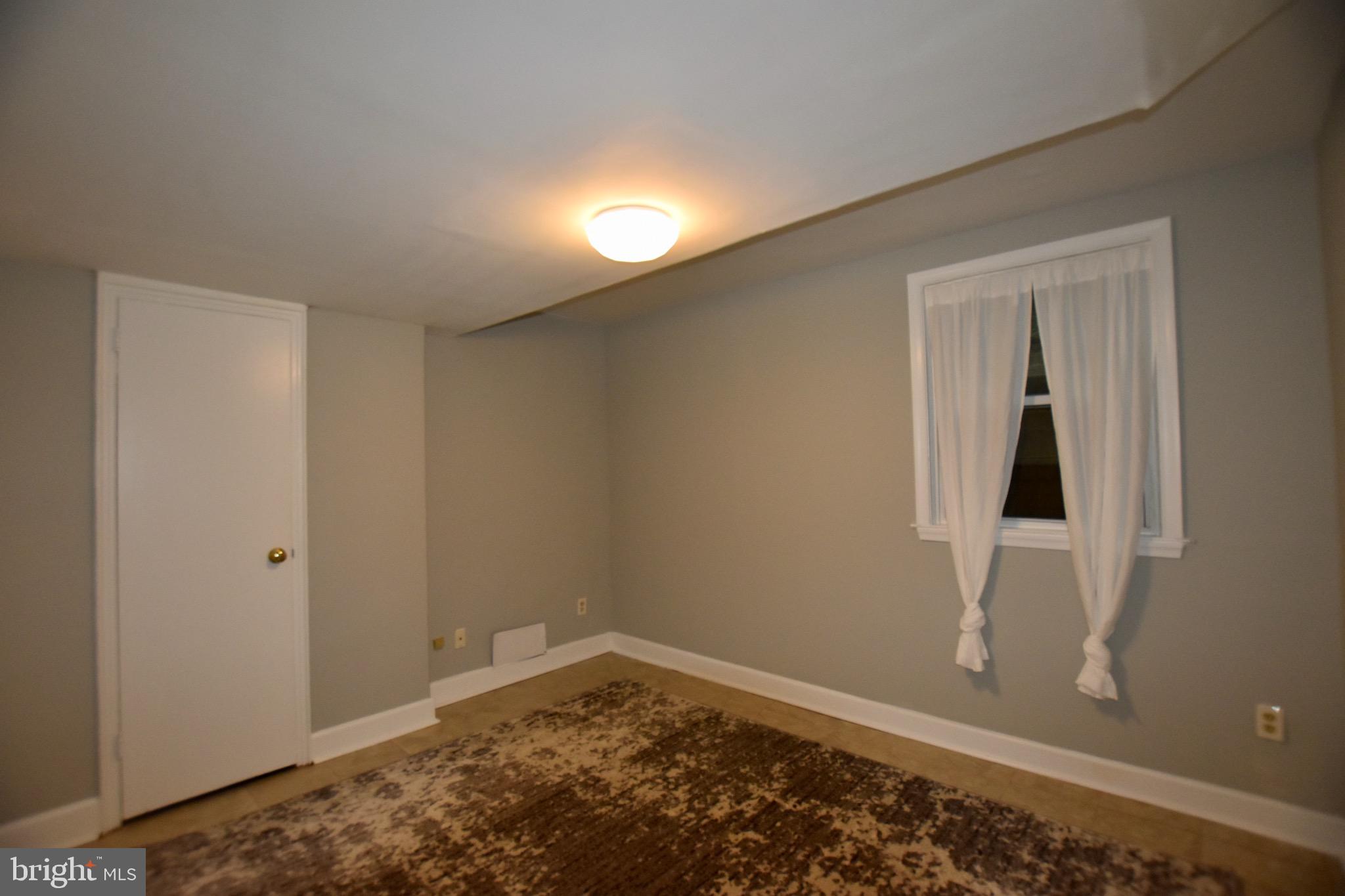 516 Thayer Avenue, Unit 2 Silver Spring, MD 20910 - Photo 3 of 12 Bedroom 1 with Ample Closet Space