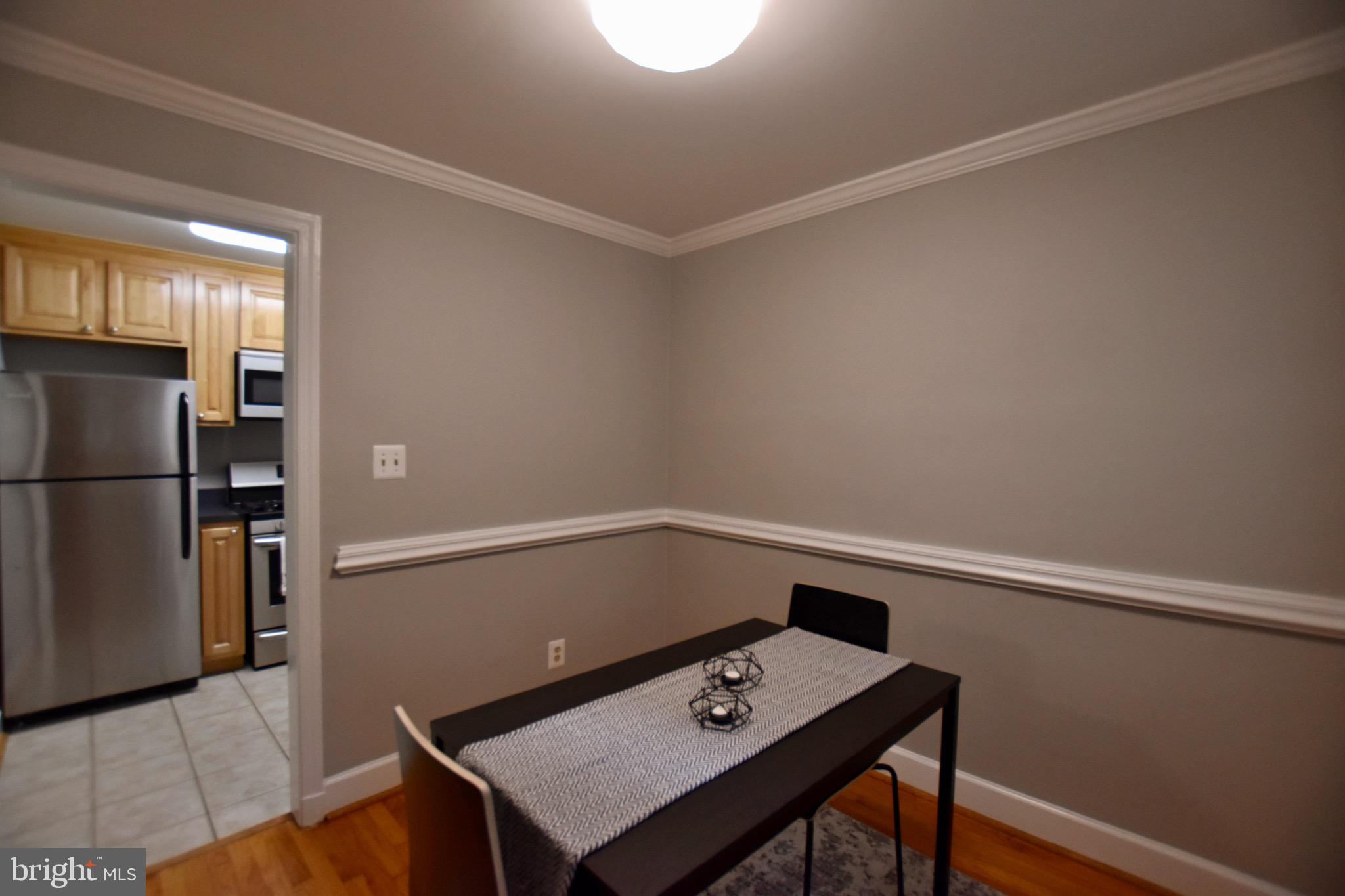 516 Thayer Avenue, Unit 2 Silver Spring, MD 20910 - Photo 10 of 12 Dining Room Connected to Kitchen