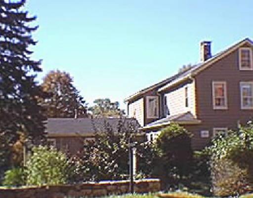 569 North Salem Road Ridgefield, CT 06877 - Photo 1 of 1 a front view of a house with a yard