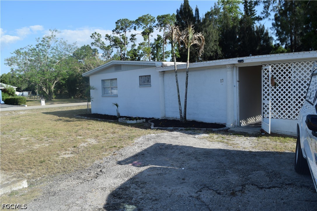 17 Colorado Road Lehigh Acres, FL 33936 - Photo 2 of 17 a view of a backyard