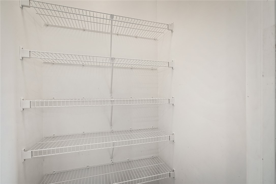 151 Wexford Drive, Unit 301 Anderson, SC 29621 - Photo 17 of 29 Functional shelving provides ample storage solutions within this space.