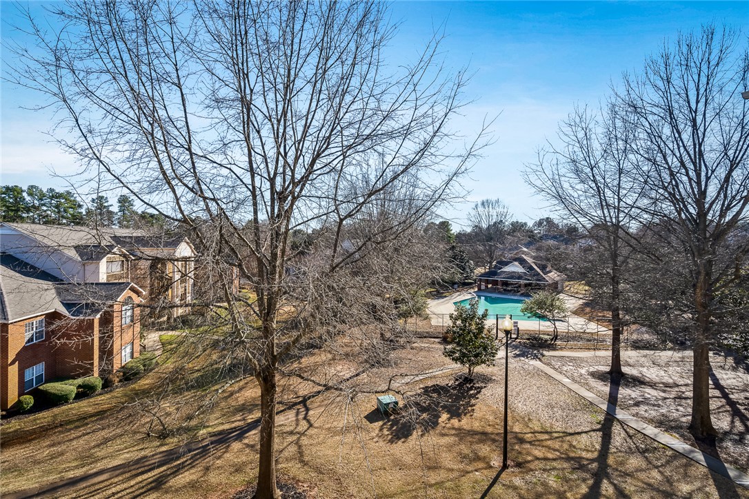 151 Wexford Drive, Unit 301 Anderson, SC 29621 - Photo 29 of 29 This community offers a refreshing pool and outdoor recreational spaces for leisure.