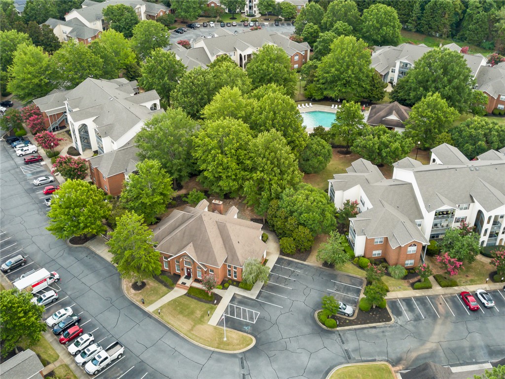 151 Wexford Drive, Unit 301 Anderson, SC 29621 - Photo 5 of 29 An aerial view showcases a vibrant residential community with ample parking.