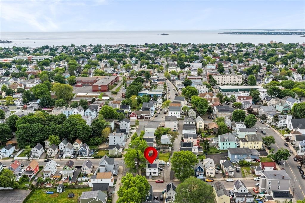 23 Logan Street Lynn, MA 01902 - Photo 24 of 27 an aerial view of residential houses with outdoor space