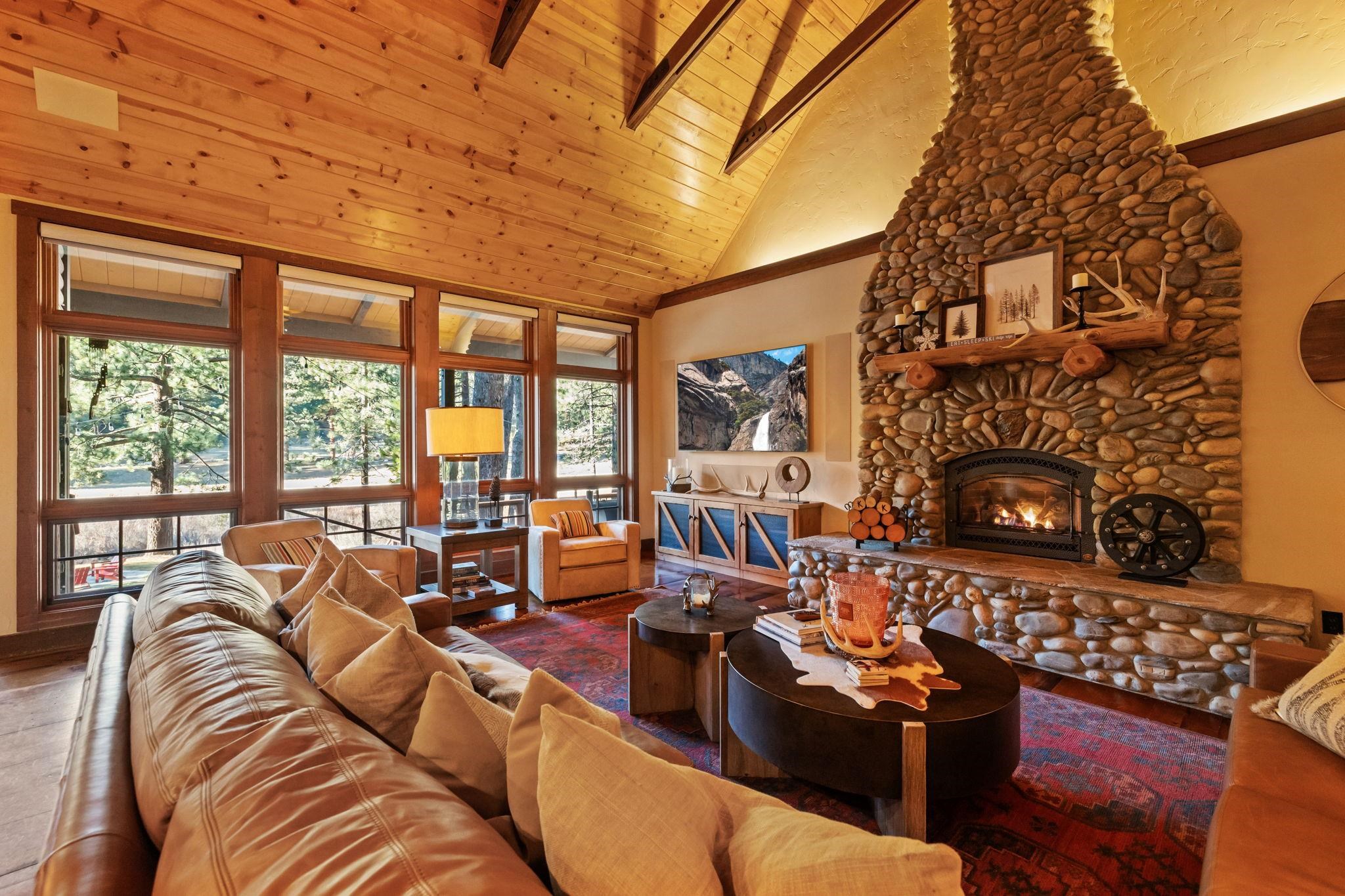 31631 Old Strawberry Road Strawberry, CA 95364 - Photo 1 of 16 a living room with furniture large window and a fireplace