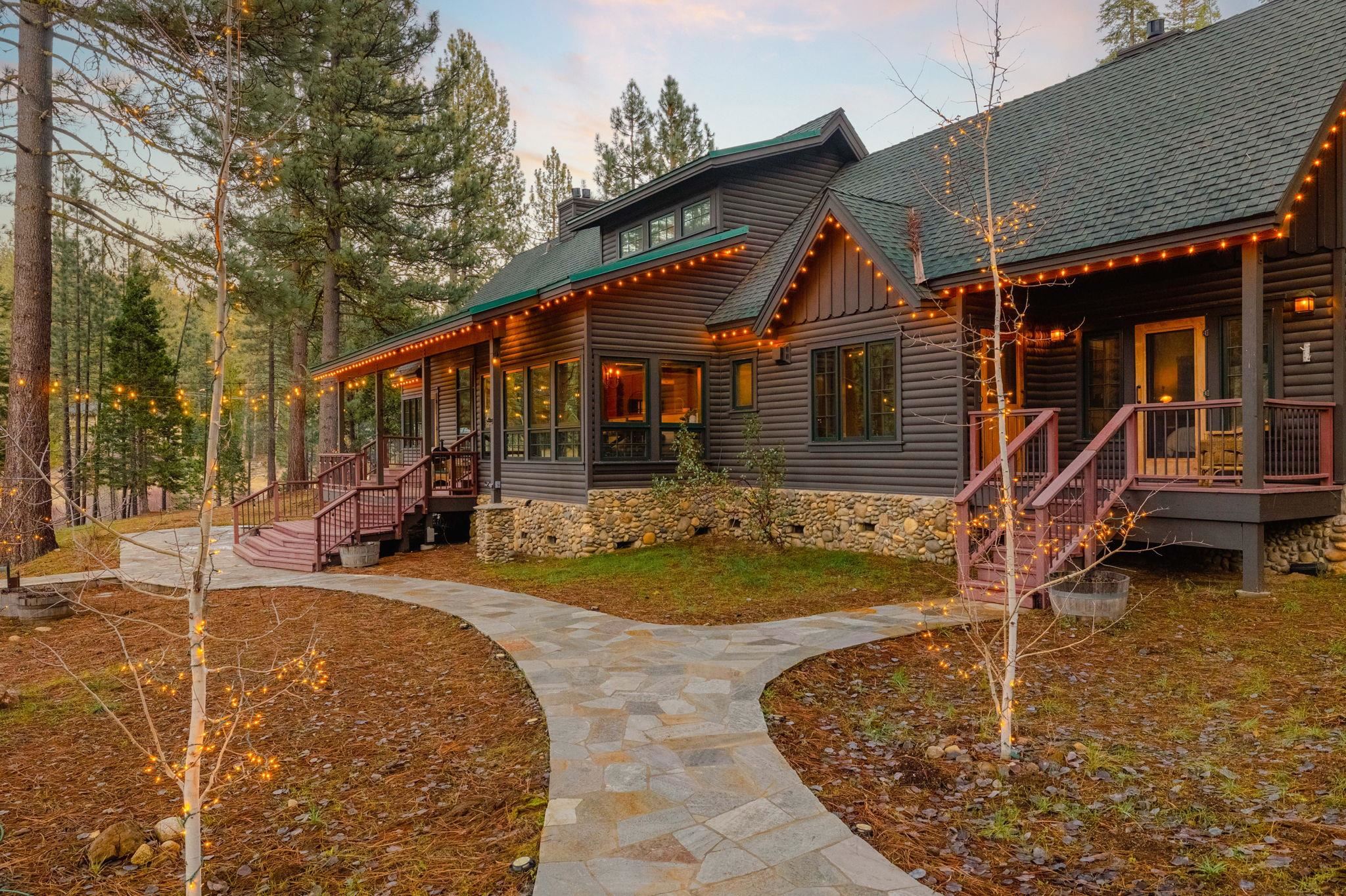 31631 Old Strawberry Road Strawberry, CA 95364 - Photo 4 of 16 a front view of a house with garden