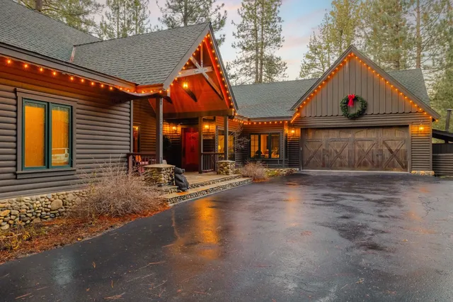 a view of a house with large windows