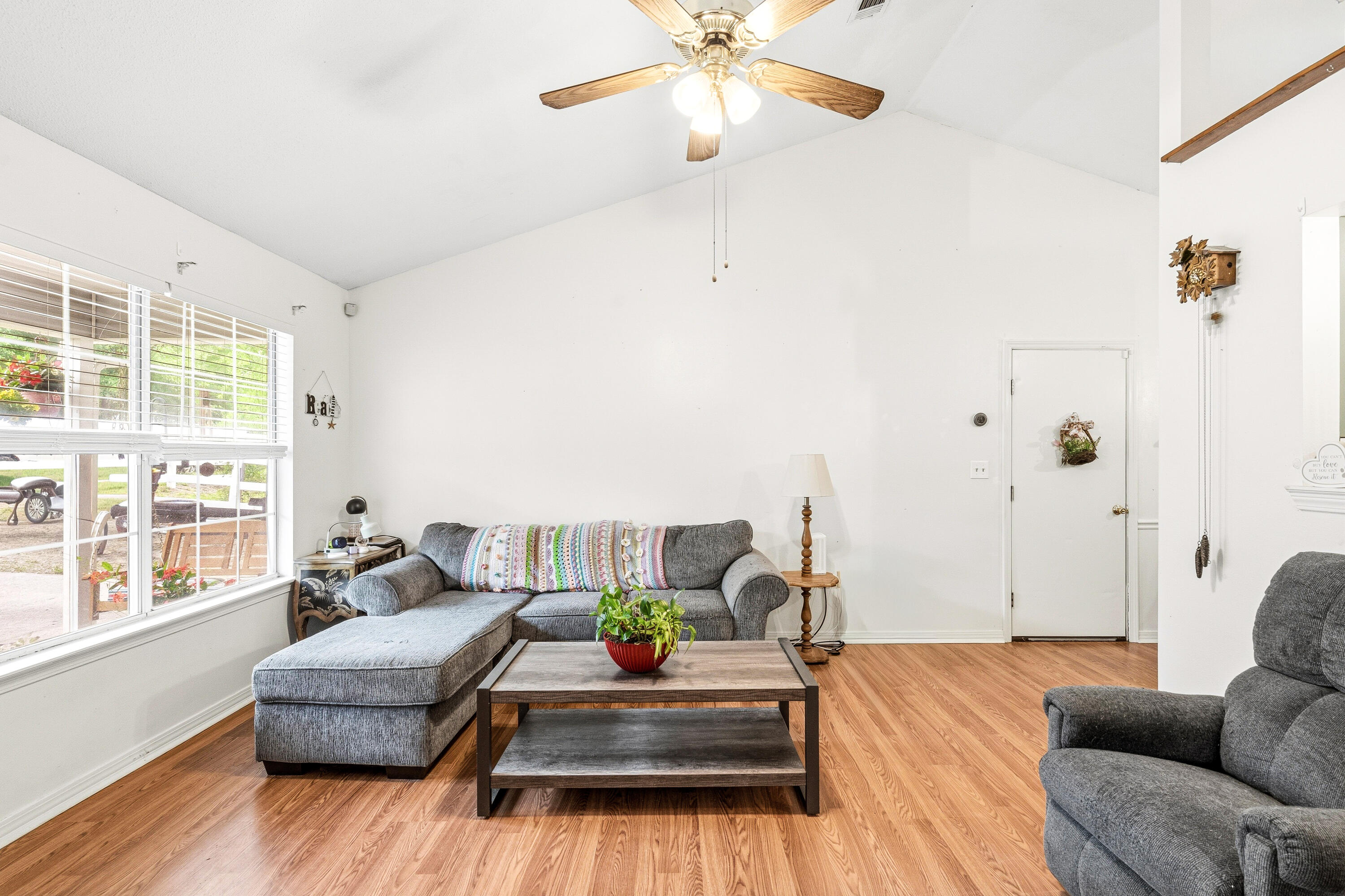 2880 Aplin Road Crestview, FL 32539 - Photo 10 of 33 a living room with furniture and wooden floor
