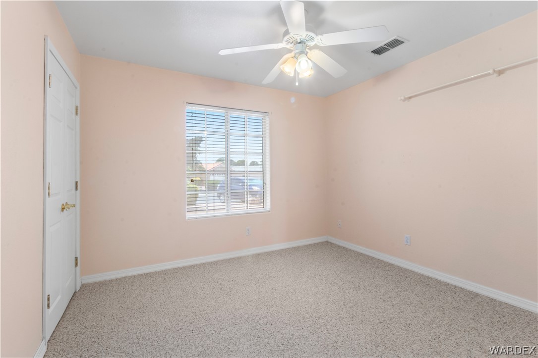 2158 Ranch Road Kingman, AZ 86401 - Photo 22 of 48 an empty room with a window