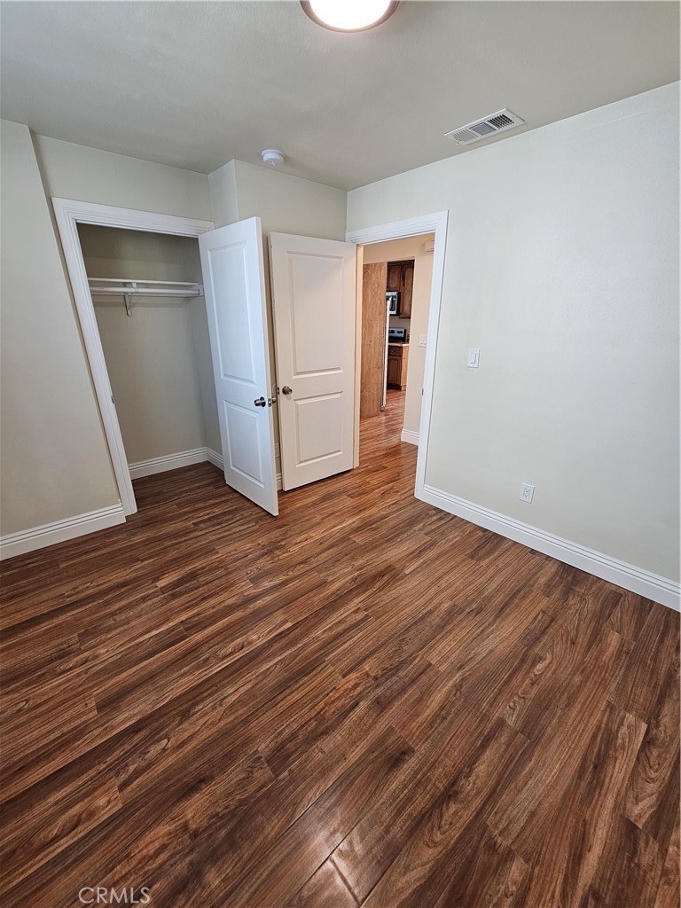 587 North Orange Street Orange, CA 92867 - Photo 10 of 15 a view of a livingroom with wooden floor and stairs