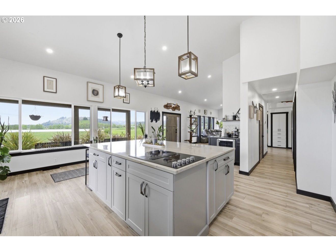 33192 Wilkins Road Eugene, OR 97408 - Photo 18 of 35 a kitchen with stainless steel appliances granite countertop a lot of counter space and wooden floors