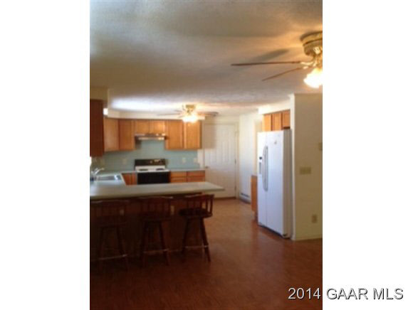 916 Emmanuel Church Road Bridgewater, VA 22812 - Photo 3 of 18 a kitchen with a sink cabinets and counter space