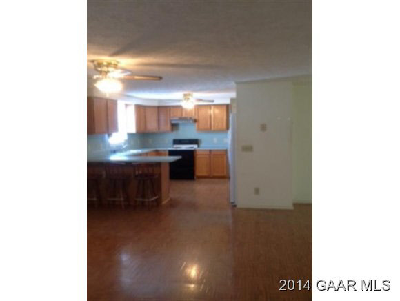 916 Emmanuel Church Road Bridgewater, VA 22812 - Photo 4 of 18 a kitchen with a sink and a refrigerator