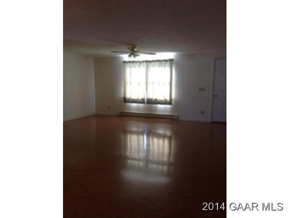 916 Emmanuel Church Road Bridgewater, VA 22812 - Photo 5 of 18 a view of a room with wooden floor and a window