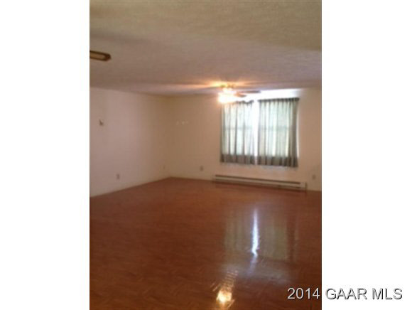 916 Emmanuel Church Road Bridgewater, VA 22812 - Photo 6 of 18 a view of an empty room with a window