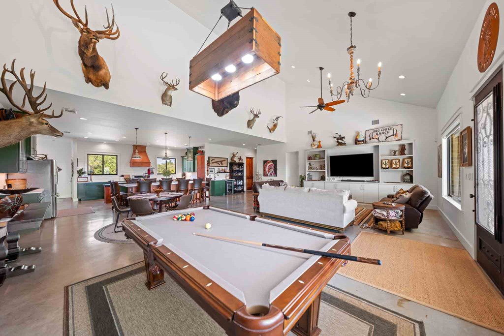 147 Gray Wolf Blanco, TX 78606 - Photo 11 of 34 a living room with lots of furniture and a flat screen tv