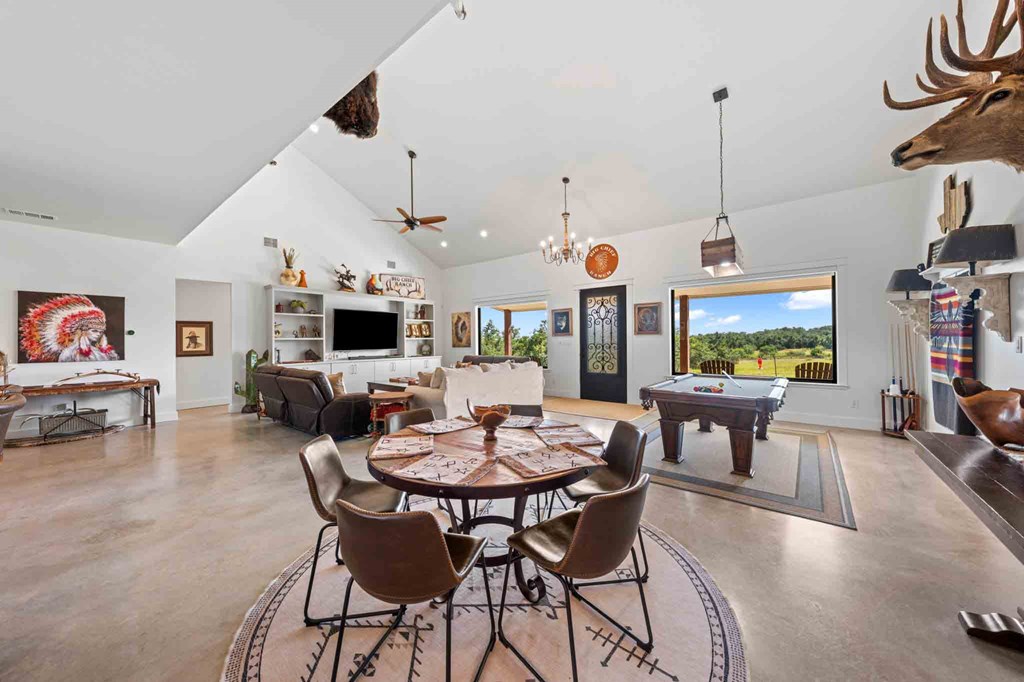 147 Gray Wolf Blanco, TX 78606 - Photo 12 of 34 a view of a dining room with furniture window and wooden floor