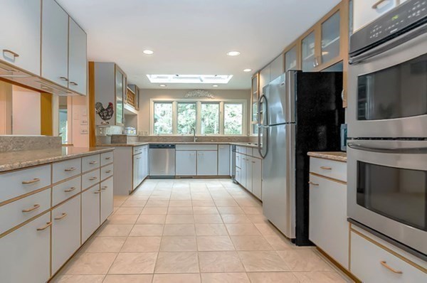 28 Register Road Marion, MA 02738 - Photo 20 of 36 a large kitchen with cabinets and stainless steel appliances