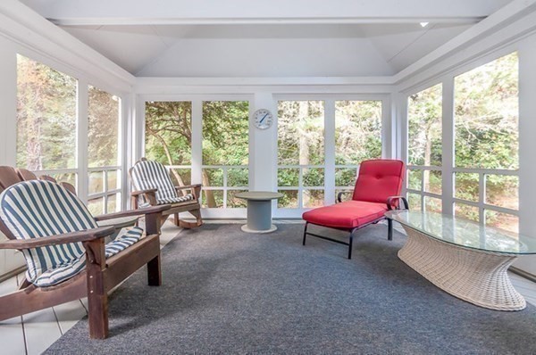 28 Register Road Marion, MA 02738 - Photo 21 of 36 a living room with furniture and floor to ceiling windows