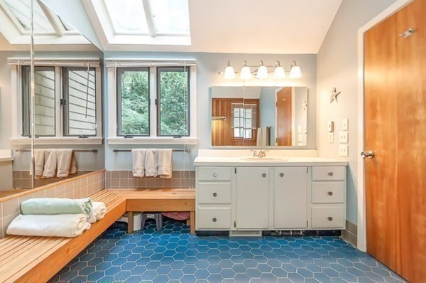 28 Register Road Marion, MA 02738 - Photo 25 of 36 a spacious bedroom with a bed and a large window