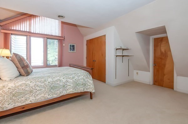 28 Register Road Marion, MA 02738 - Photo 29 of 36 a bedroom with a bed and a window