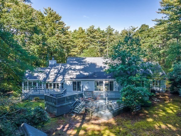 28 Register Road Marion, MA 02738 - Photo 4 of 36 a view of house with outdoor seating and green space