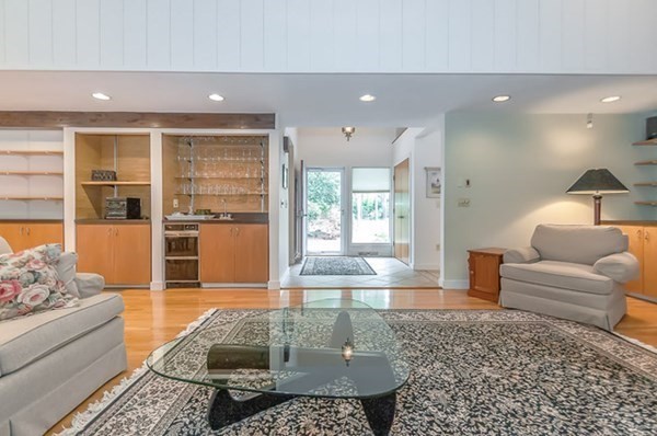 28 Register Road Marion, MA 02738 - Photo 9 of 36 a living room with furniture and a large window