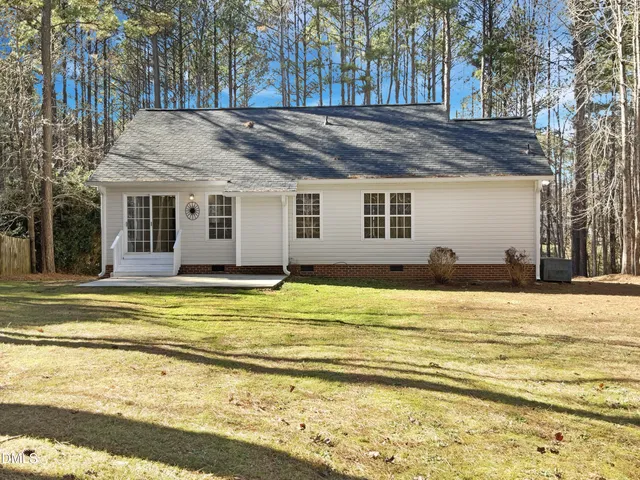a view of a house with a swimming pool