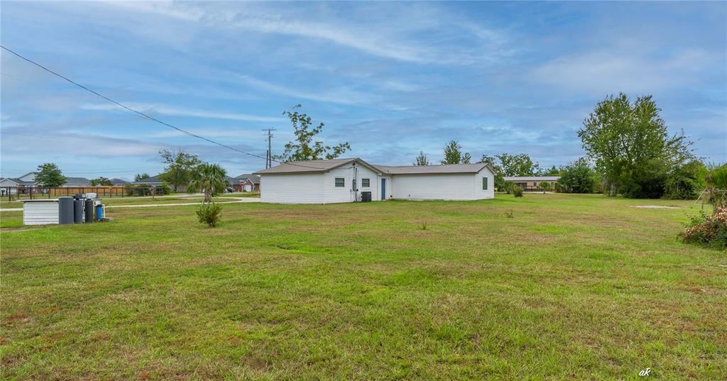 5338 Frank Hough Road Panama City, FL 32404 - Photo 4 of 29 a view of a house with a yard