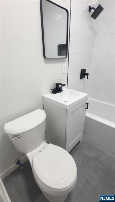 207 Valley Road, Unit 7 Clifton, NJ 07013 - Photo 8 of 8 a bathroom with a toilet a sink and mirror